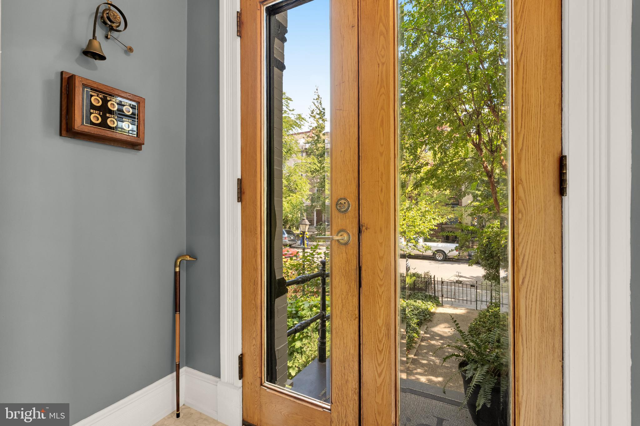 1704 19th Street Northwest, Unit 5 Washington, DC 20009 - Photo 3 of 25 a view of a hallway with wooden floor and a bathroom view