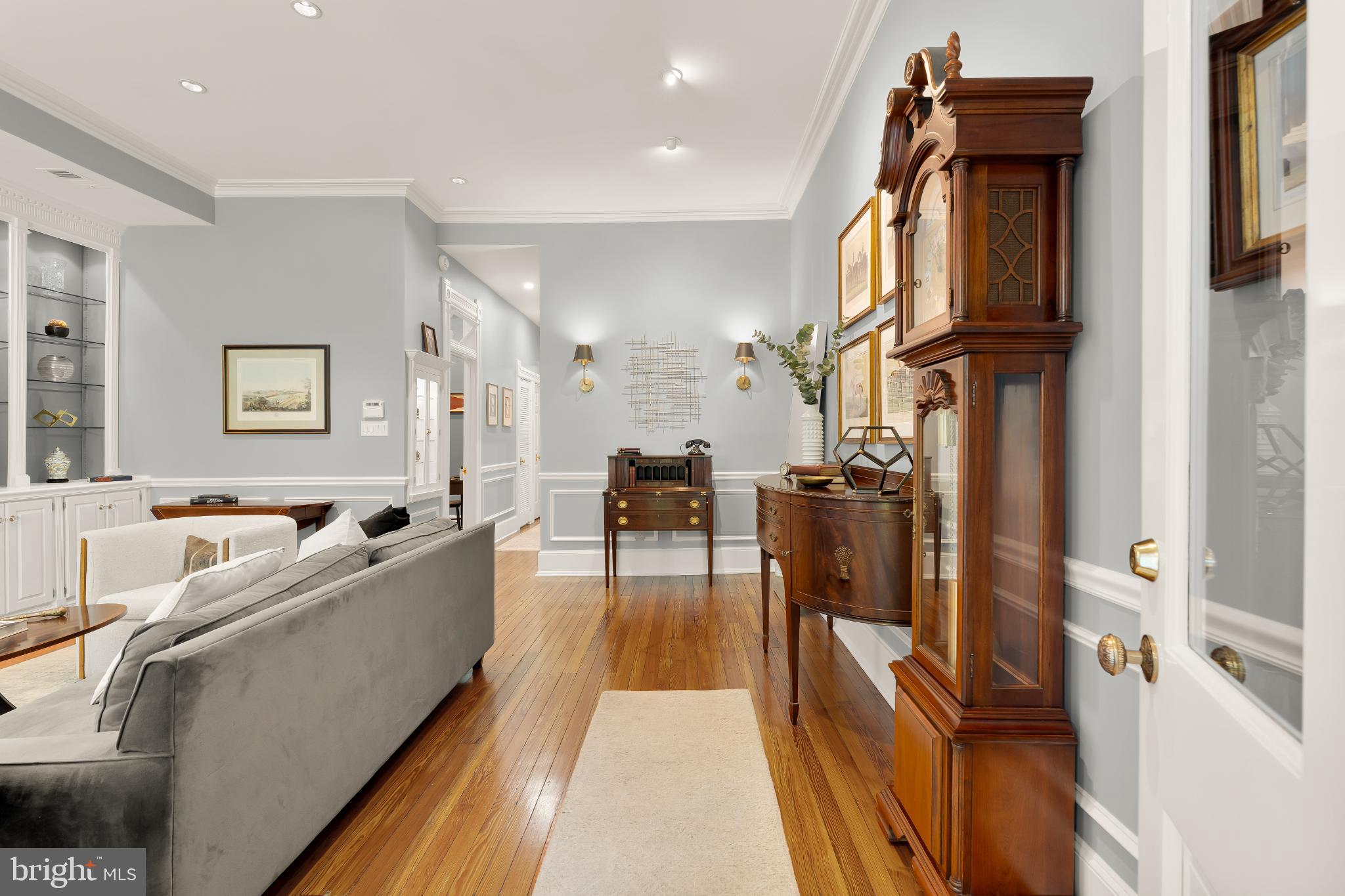 1704 19th Street Northwest, Unit 5 Washington, DC 20009 - Photo 5 of 25 a living room with furniture and a fireplace