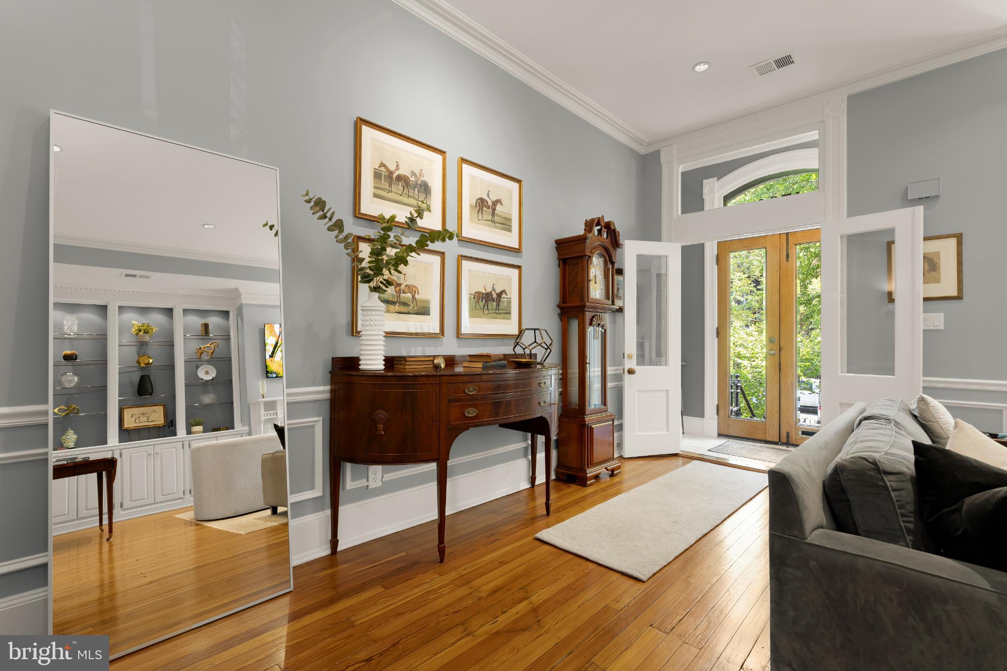 1704 19th Street Northwest, Unit 5 Washington, DC 20009 - Photo 6 of 25 a living room with furniture fireplace and a large window