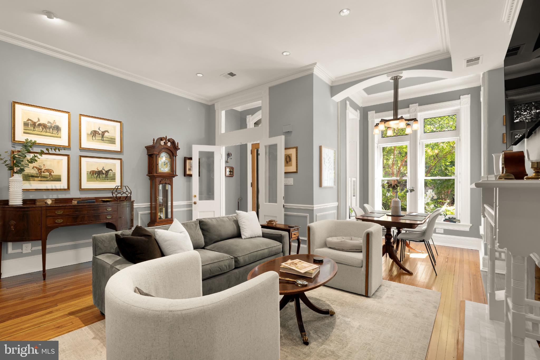1704 19th Street Northwest, Unit 5 Washington, DC 20009 - Photo 9 of 25 a living room with furniture and a large window
