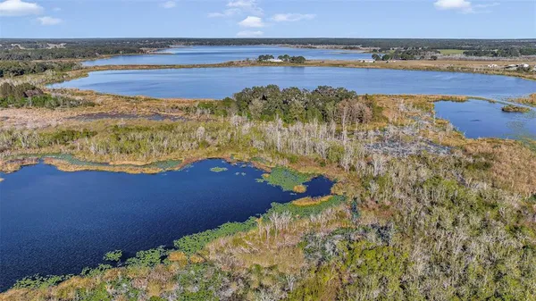 a view of a lake with a mountain in the background