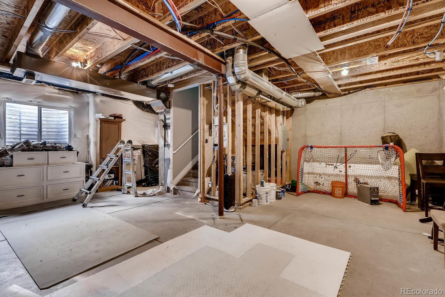 10261 Bellwether Lane Lone Tree, CO 80124 - Photo 20 of 35 a view of a room with gym equipment