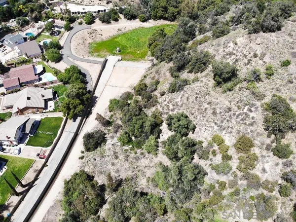 an aerial view of residential house with outdoor space