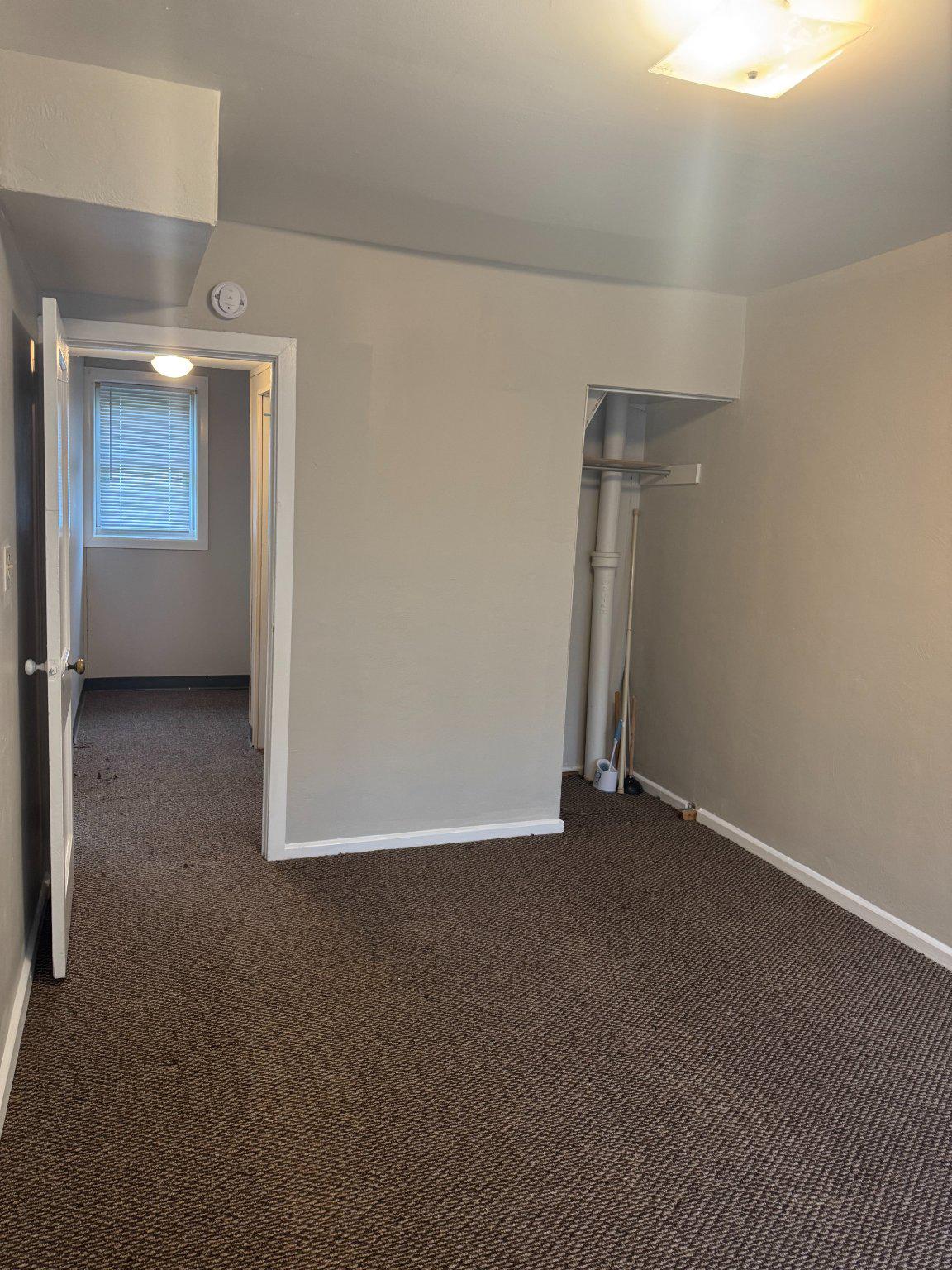 410 Austin Court Wallingford, PA 19086 - Photo 14 of 16 Carpeted bedroom with closet