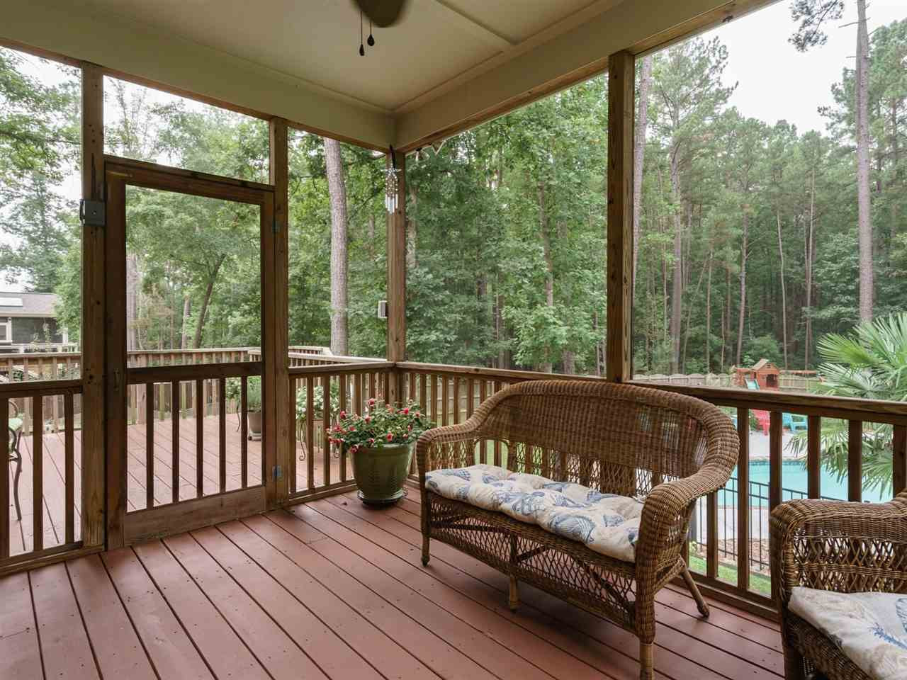 4844 Inwood Road Raleigh, NC 27603 - Photo 19 of 25 The entertaining space continues to the great outdoor space at this home. The screen porch can be used many months of the year with our favorable North Carolina climate. Just bring your grill to the deck and you're ready to entertain. Screen Porch