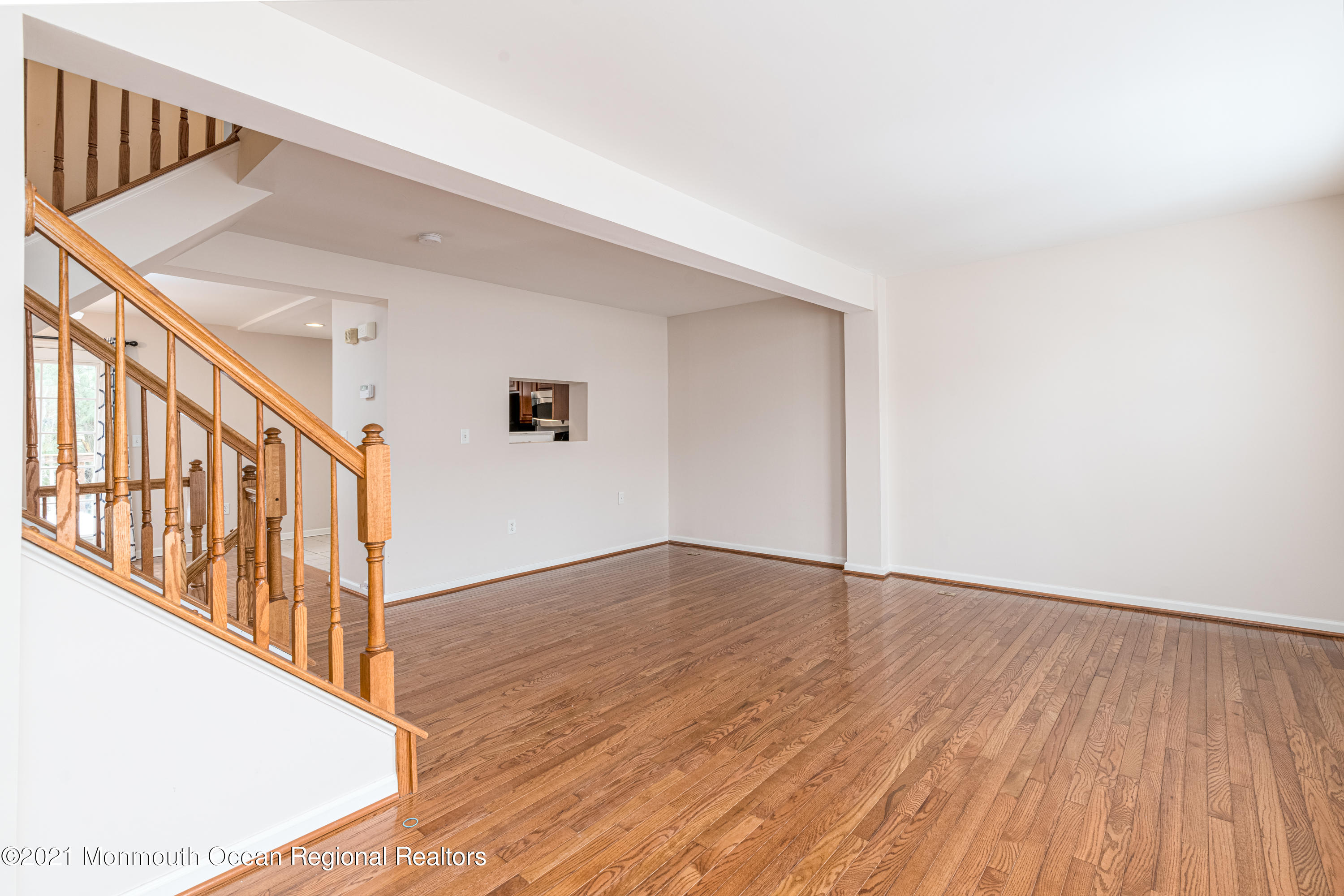 53 Saxton Road Farmingdale, NJ 07727 - Photo 11 of 22 a view of an entryway with wooden floor