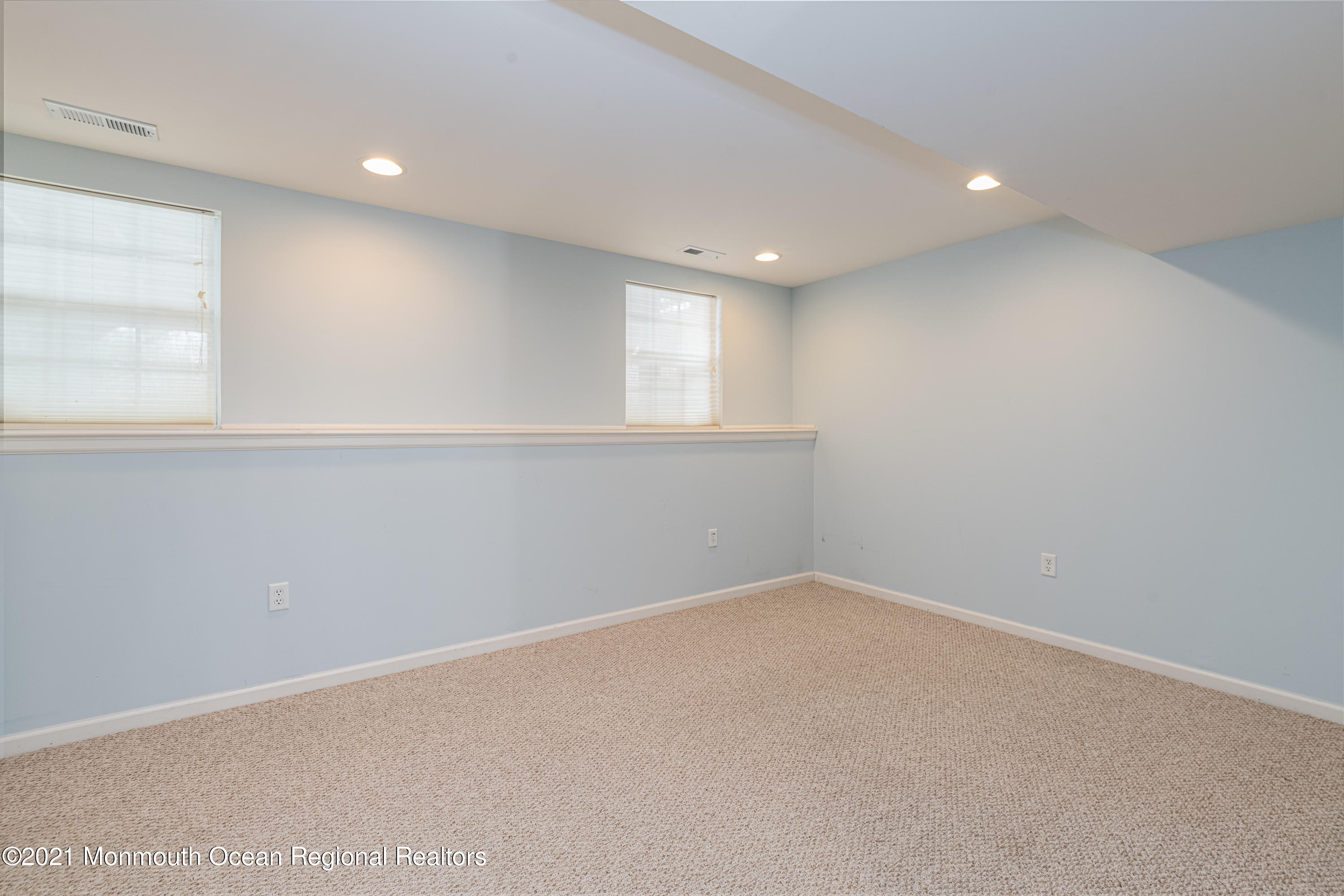53 Saxton Road Farmingdale, NJ 07727 - Photo 4 of 22 an empty room with a window