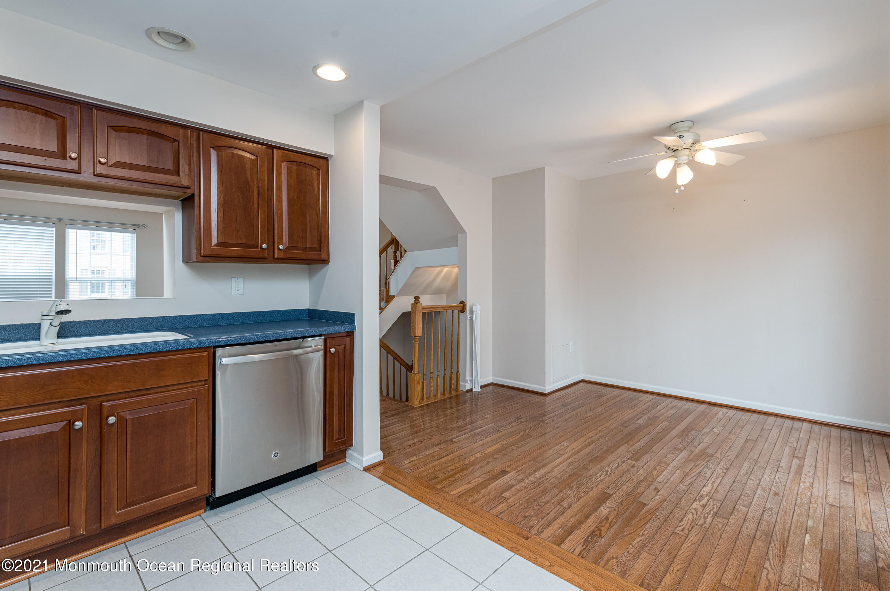 53 Saxton Road Farmingdale, NJ 07727 - Photo 8 of 22 a kitchen with granite countertop cabinets and wooden floor