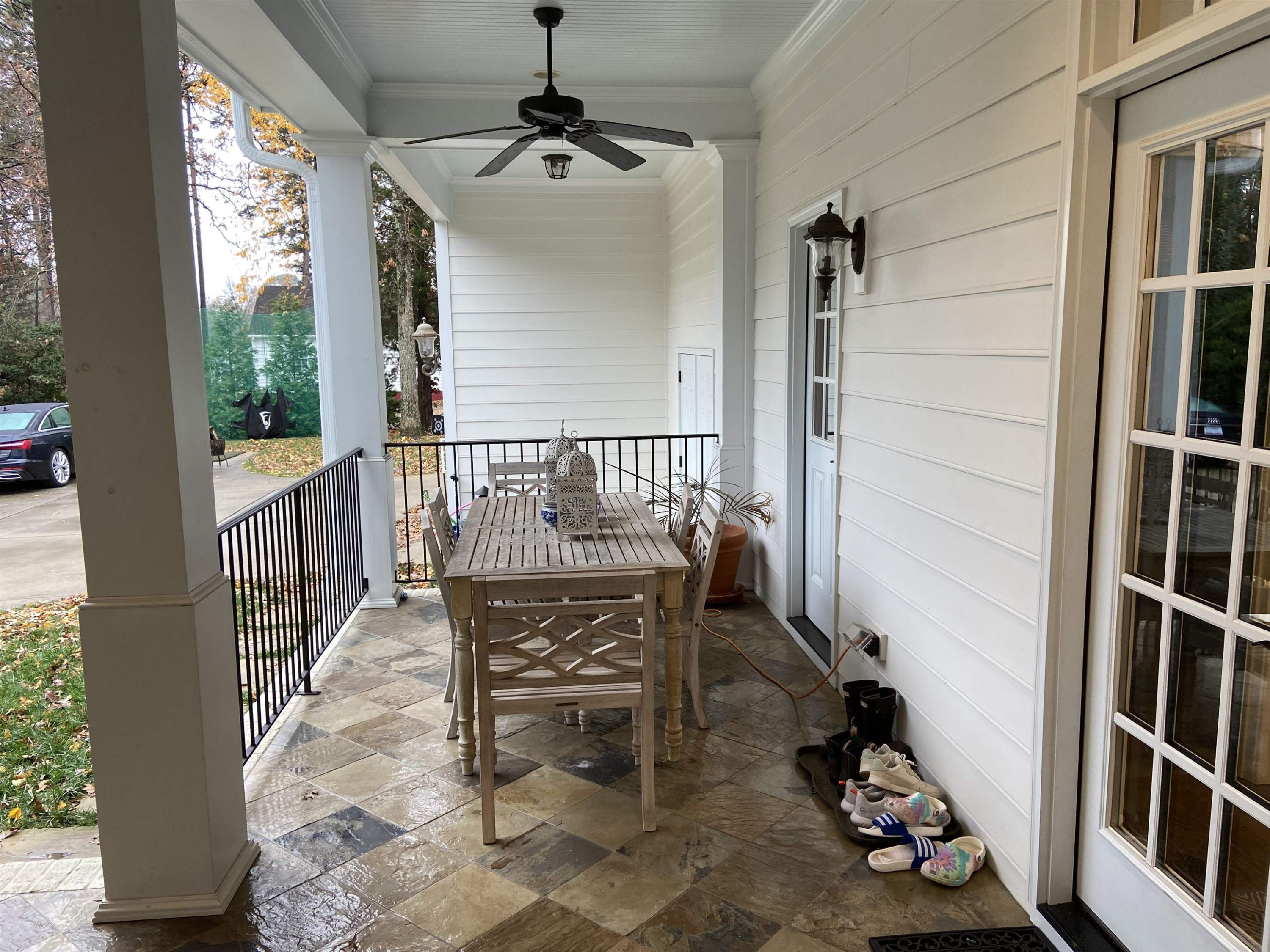 3319 Hampton Road Raleigh, NC 27607 - Photo 11 of 18 a view of a balcony with chairs and wooden floor