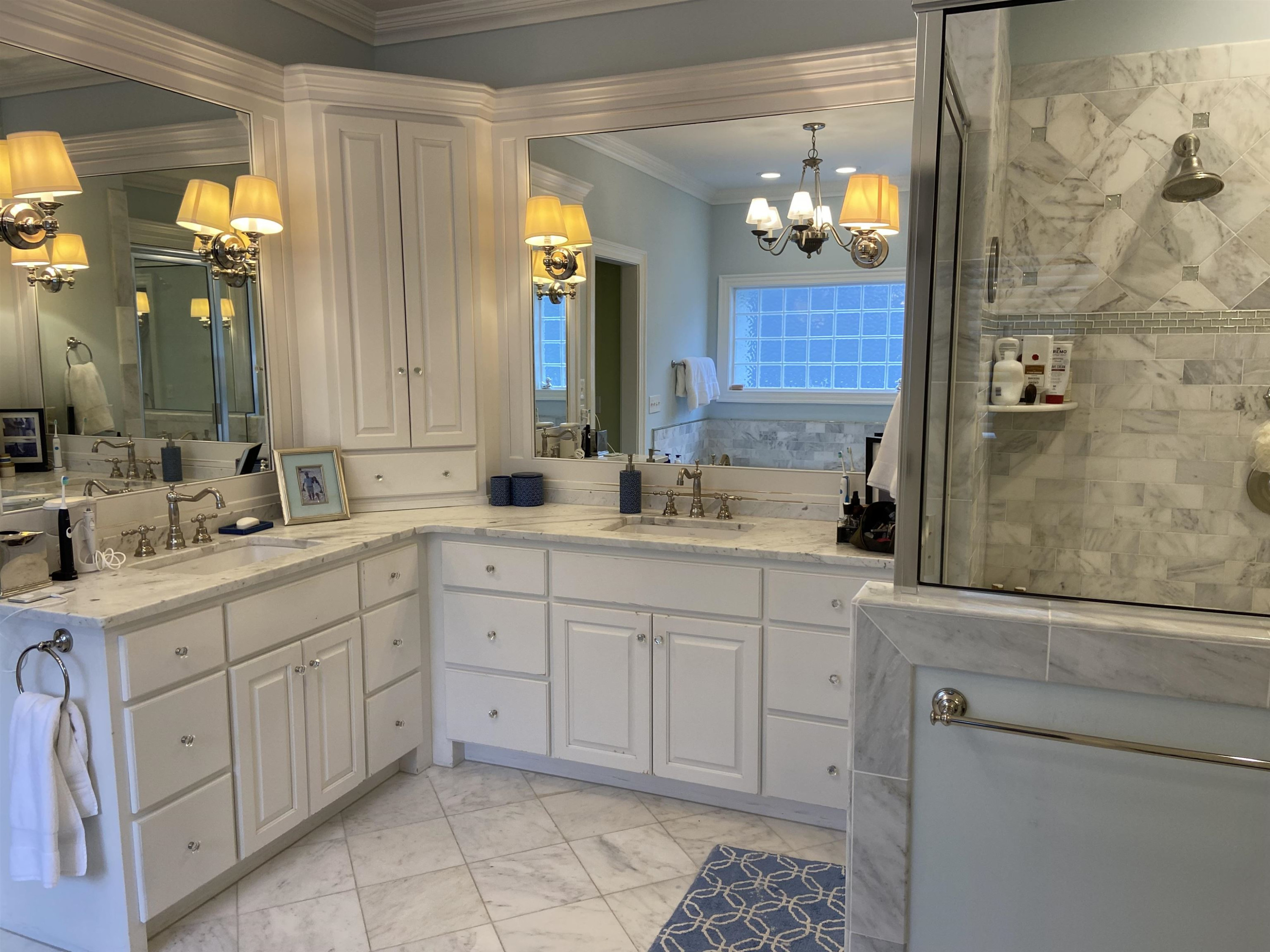 3319 Hampton Road Raleigh, NC 27607 - Photo 14 of 18 a spacious bathroom with double sink and a mirror