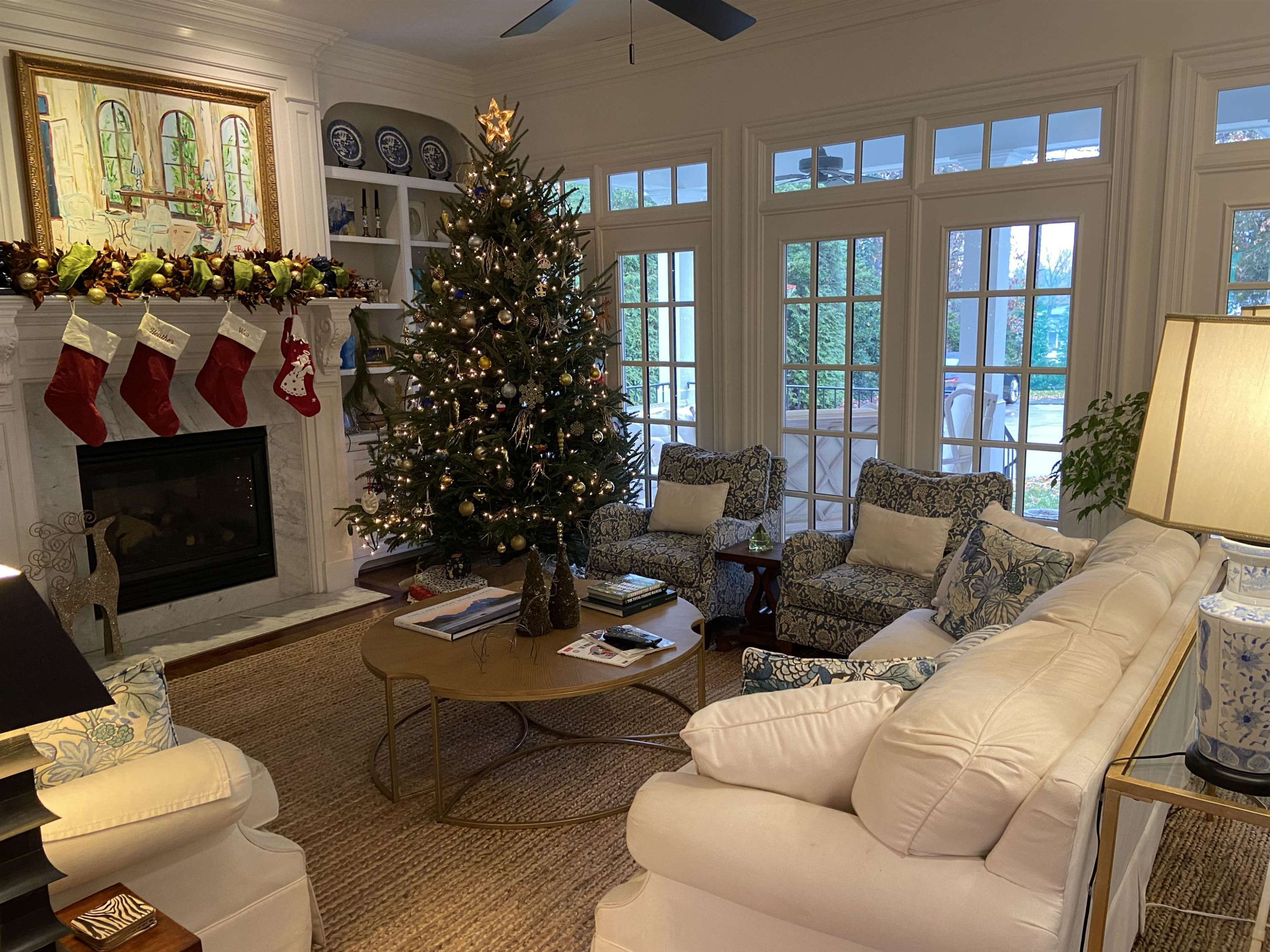 3319 Hampton Road Raleigh, NC 27607 - Photo 4 of 18 a living room with furniture potted plant and a fireplace