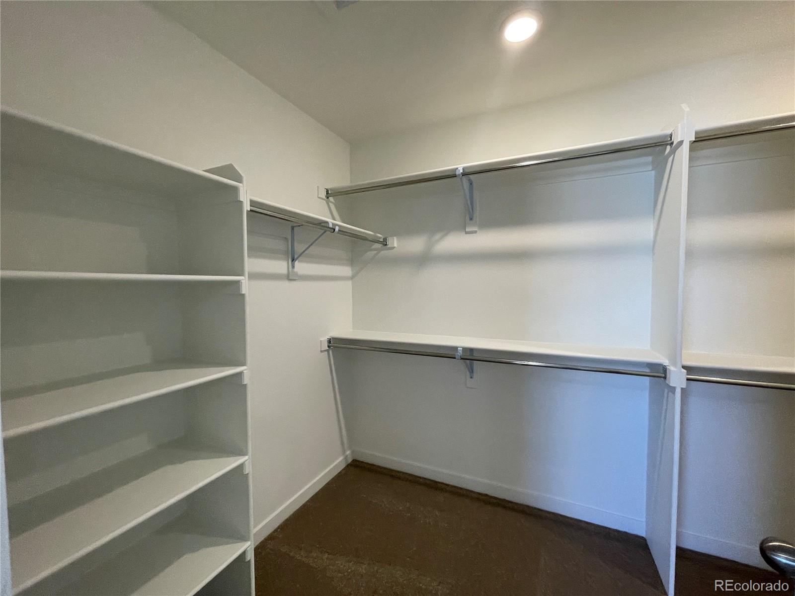 755 Yankee Boy Loop Elizabeth, CO 80107 - Photo 15 of 31 a view of an empty walk in closet