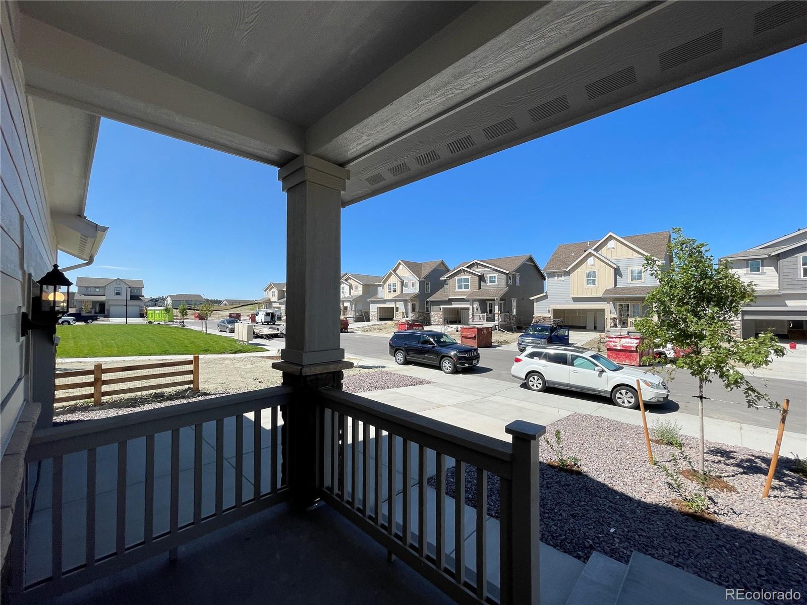 755 Yankee Boy Loop Elizabeth, CO 80107 - Photo 25 of 31 a view of a balcony with chairs
