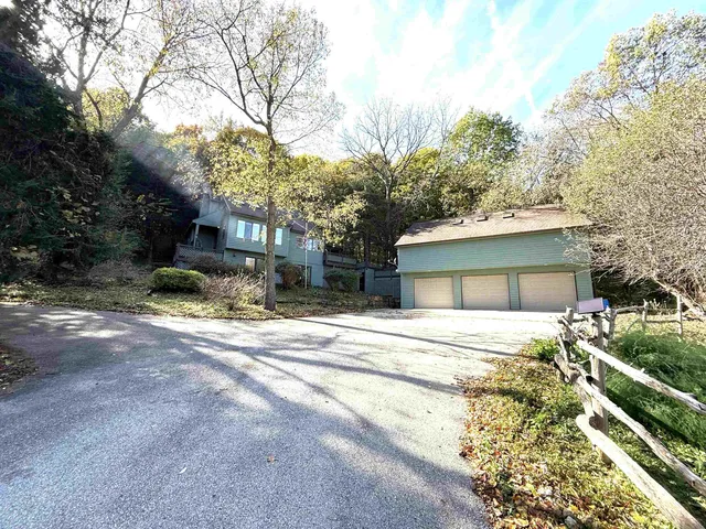 a house with trees in front of it