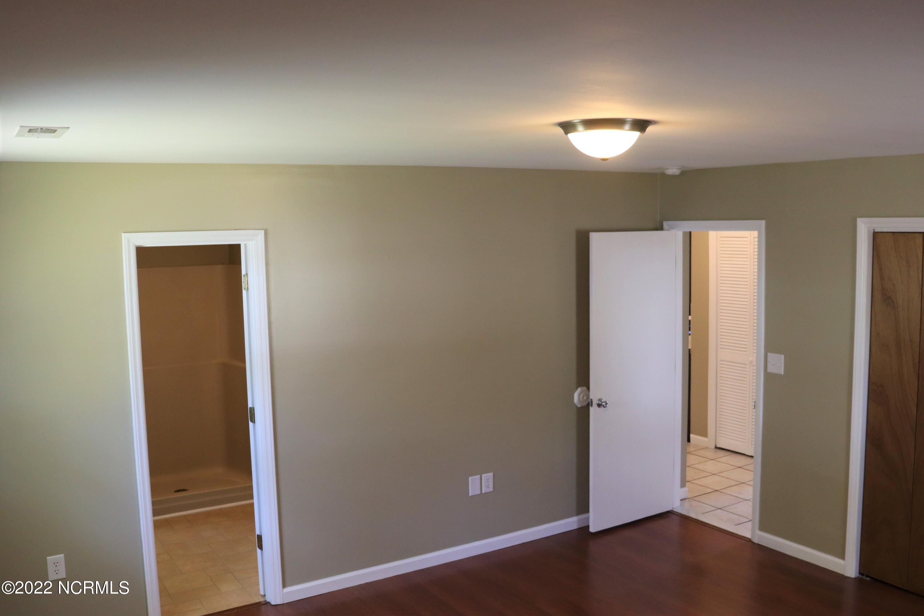 2571 East Boiling Spring Road Southport, NC 28461 - Photo 11 of 24 Master Bedroom