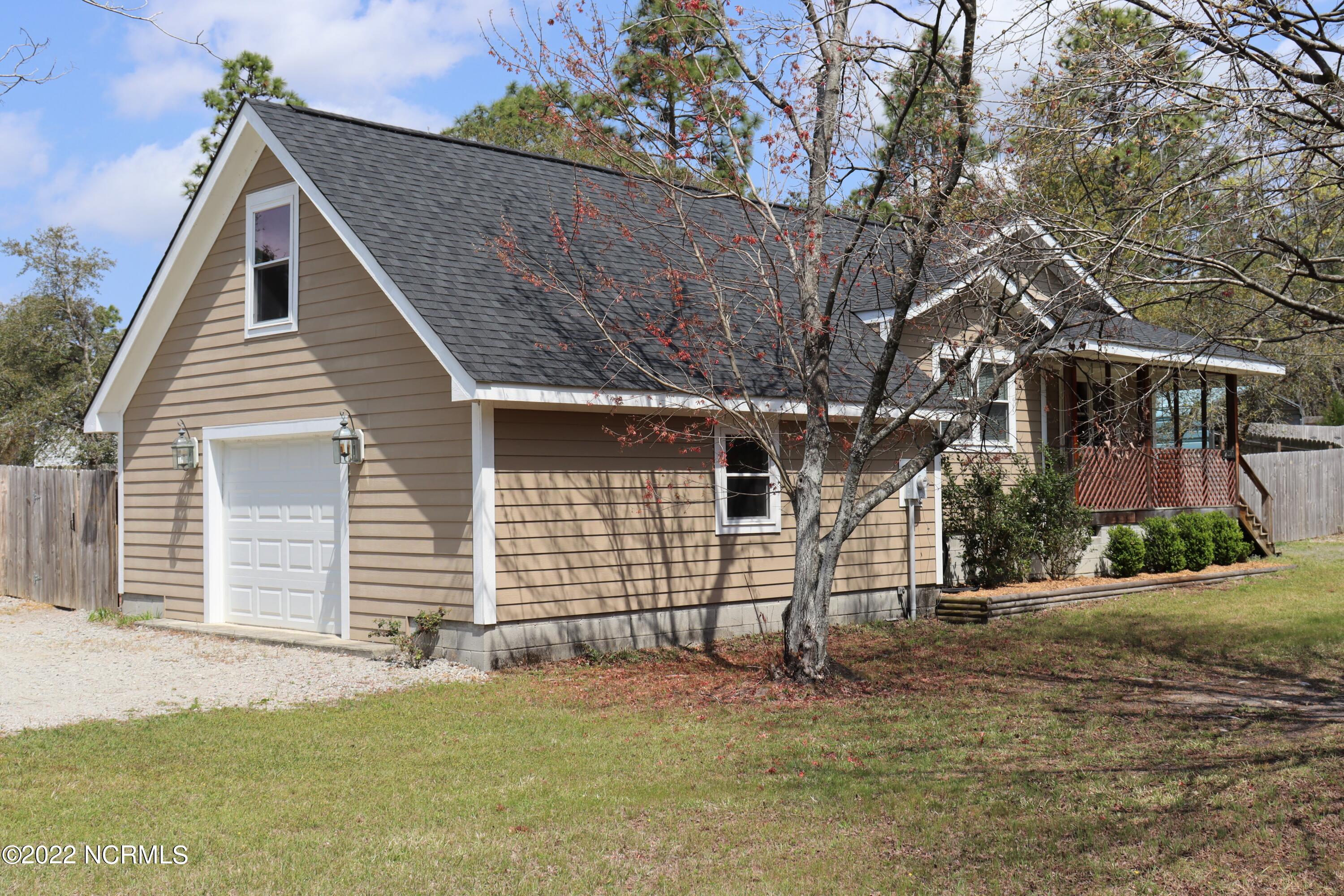 2571 East Boiling Spring Road Southport, NC 28461 - Photo 2 of 24 Garage Side