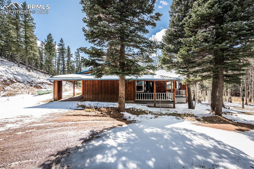 38 Wetmore Drive Rye, CO 81069 - Photo 2 of 49 a view of a house with a yard covered in snow