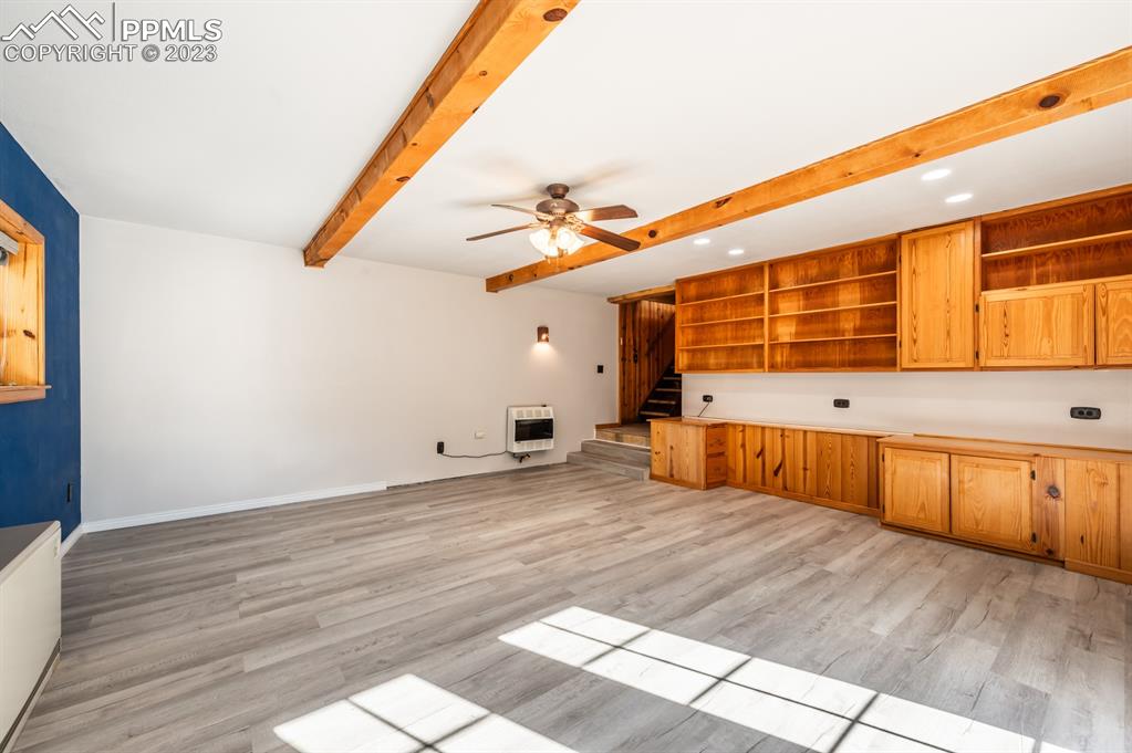 38 Wetmore Drive Rye, CO 81069 - Photo 26 of 49 a view of a kitchen with wooden floor and a large window