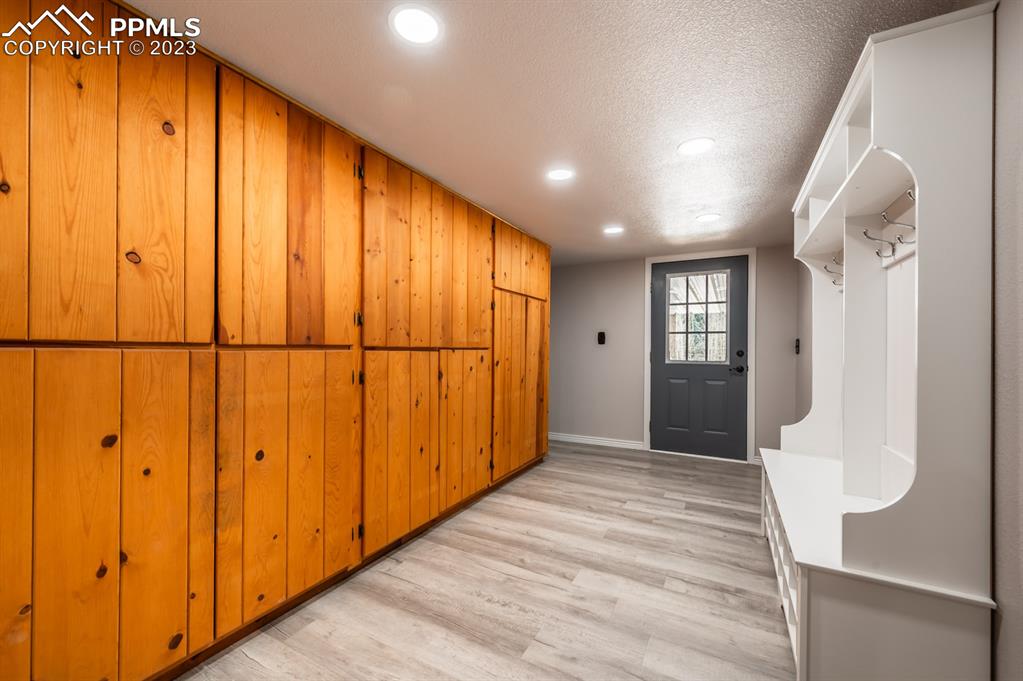 38 Wetmore Drive Rye, CO 81069 - Photo 33 of 49 a view of a hallway with wooden walls