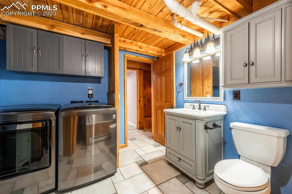 38 Wetmore Drive Rye, CO 81069 - Photo 37 of 49 a bathroom with a sink a toilet and vanity