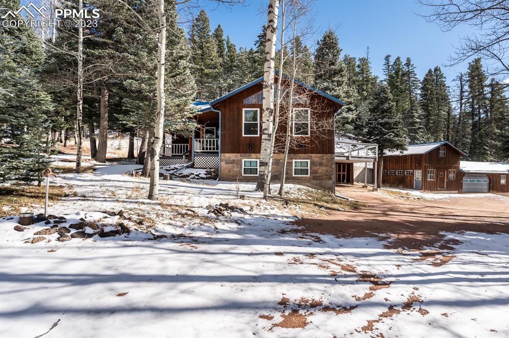 38 Wetmore Drive Rye, CO 81069 - Photo 4 of 49 a view of a house with a yard covered with snow