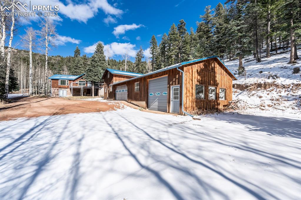 38 Wetmore Drive Rye, CO 81069 - Photo 49 of 49 a view of backyard with large trees and wooden fence