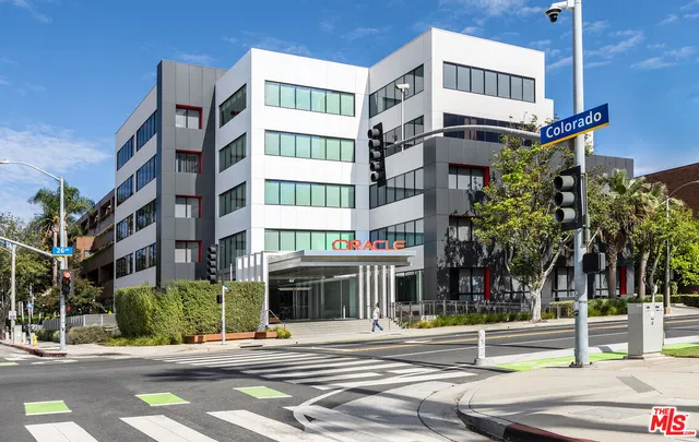 a front view of a building with street view