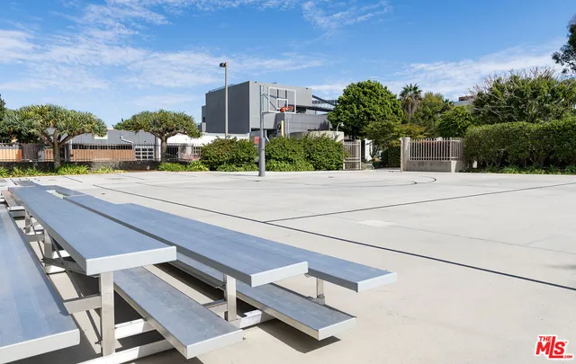 a building with trees in front of it