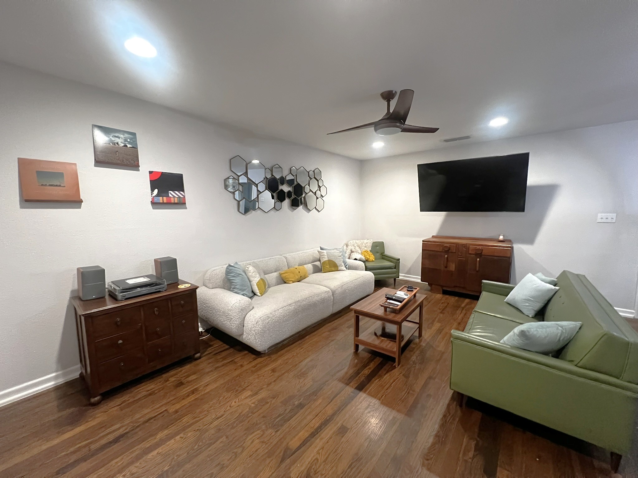 1311 Aggie Lane, Unit A Austin, TX 78757 - Photo 3 of 13 Living area with dark wood-type flooring, a ceiling fan, recessed lighting, and baseboards