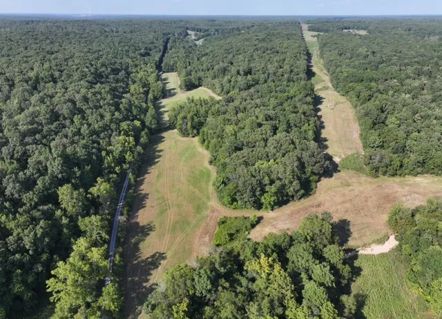 an aerial view of mountain with outdoor space