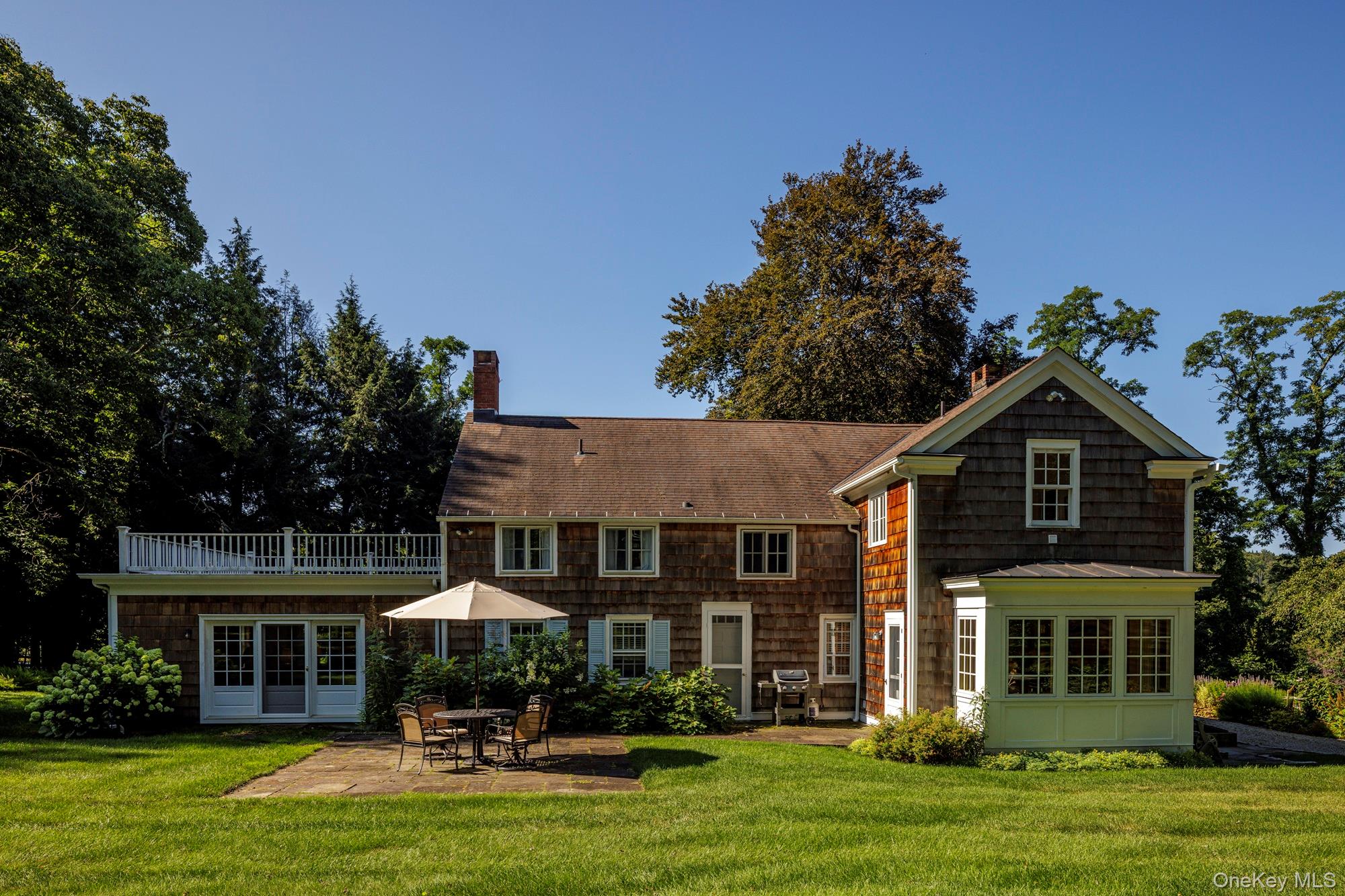 425 Camby Road Millbrook, NY 12545 - Photo 22 of 39 a front view of a houses with yard and green space