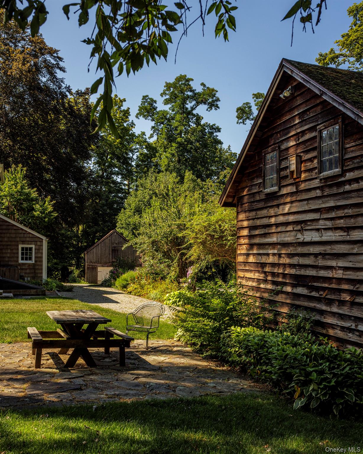 425 Camby Road Millbrook, NY 12545 - Photo 3 of 39 a view of swimming pool with lawn chairs and plants