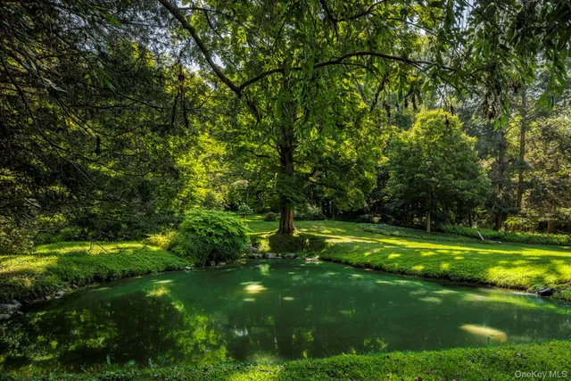 a view of a golf course with a lake