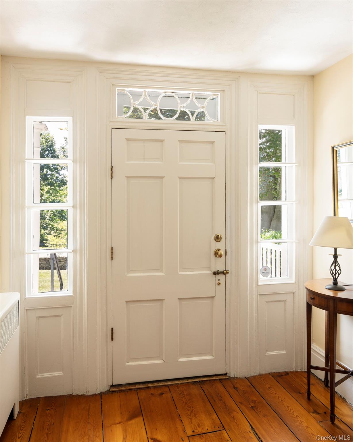 425 Camby Road Millbrook, NY 12545 - Photo 7 of 39 a view of a livingroom with wooden floor and a window