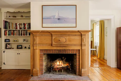 a room with furniture and a book shelf