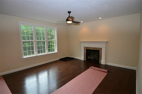 Lot 3 Harvard Road Bolton, MA 01740 - Photo 20 of 23 a view of empty room with wooden floor and fan