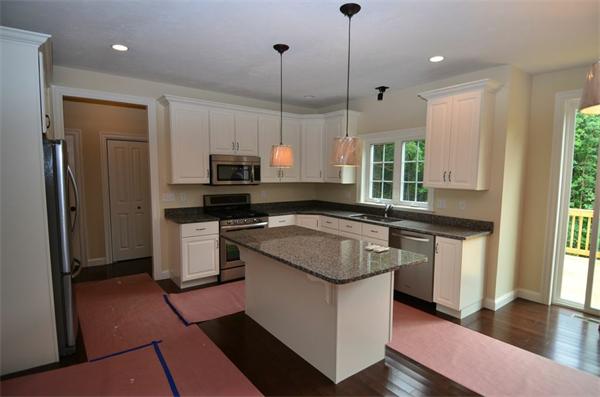 Lot 3 Harvard Road Bolton, MA 01740 - Photo 2 of 23 a kitchen with stainless steel appliances granite countertop a stove a sink a refrigerator and a microwave