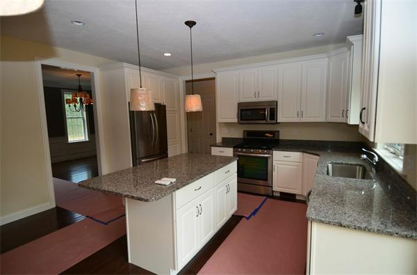 Lot 3 Harvard Road Bolton, MA 01740 - Photo 4 of 23 a kitchen with granite countertop a stove and a sink