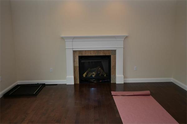 Lot 3 Harvard Road Bolton, MA 01740 - Photo 7 of 23 a living room with a fireplace