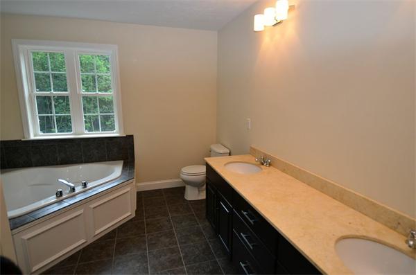 Lot 3 Harvard Road Bolton, MA 01740 - Photo 9 of 23 a bathroom with a sink and a bathtub