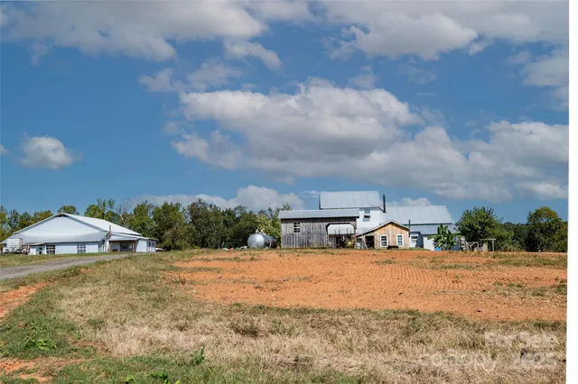 a view of a yard with an outdoor space