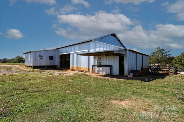 an aerial view of residential house with outdoor space