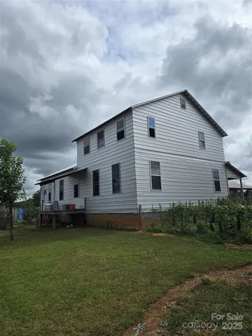 a house view with a garden space