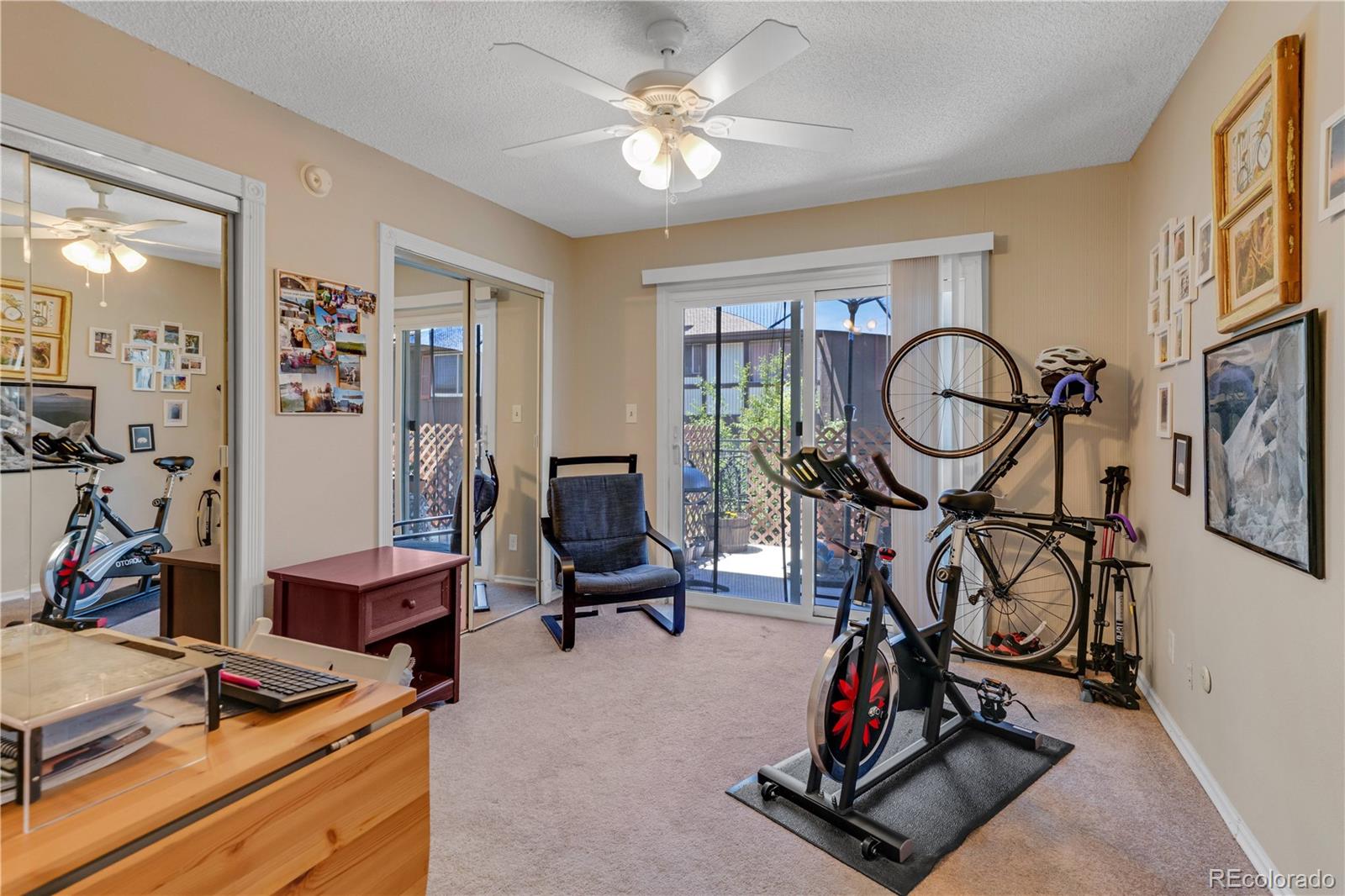 3855 South Monaco Street, Unit 203 Denver, CO 80237 - Photo 14 of 26 a view of a room with gym equipment