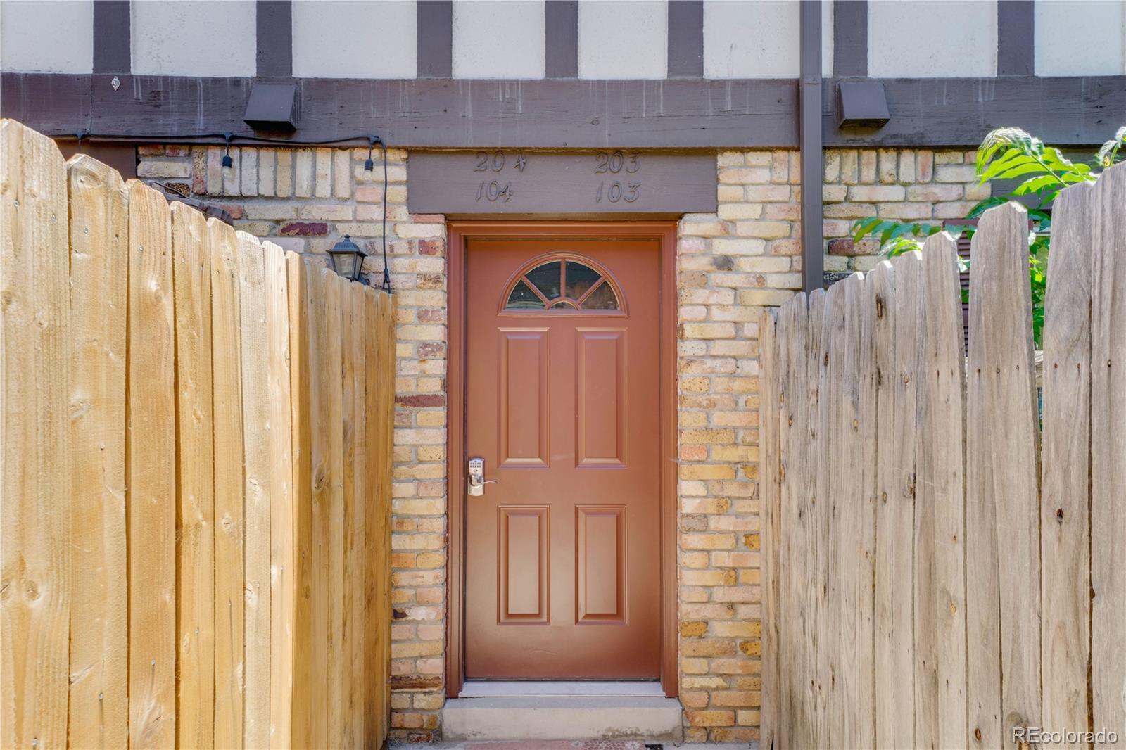 3855 South Monaco Street, Unit 203 Denver, CO 80237 - Photo 23 of 26 a view of front door of house