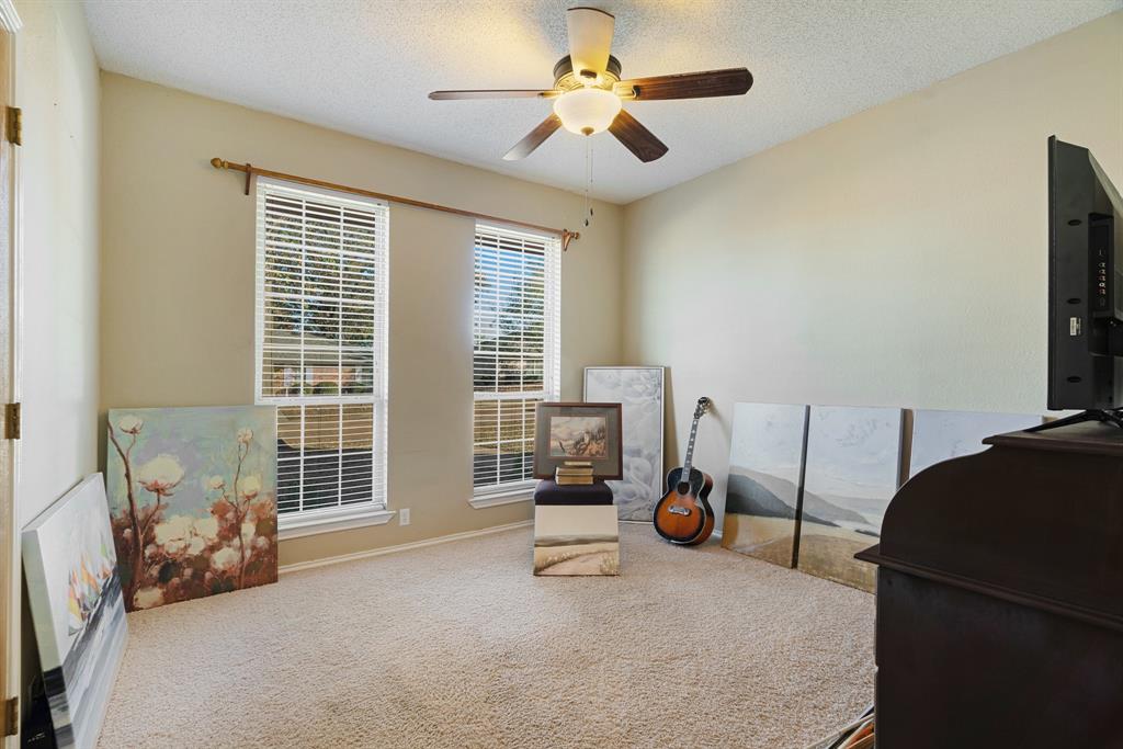 925 Medalist Street Paris, TX 75460 - Photo 18 of 24 a view of a room with gym equipment