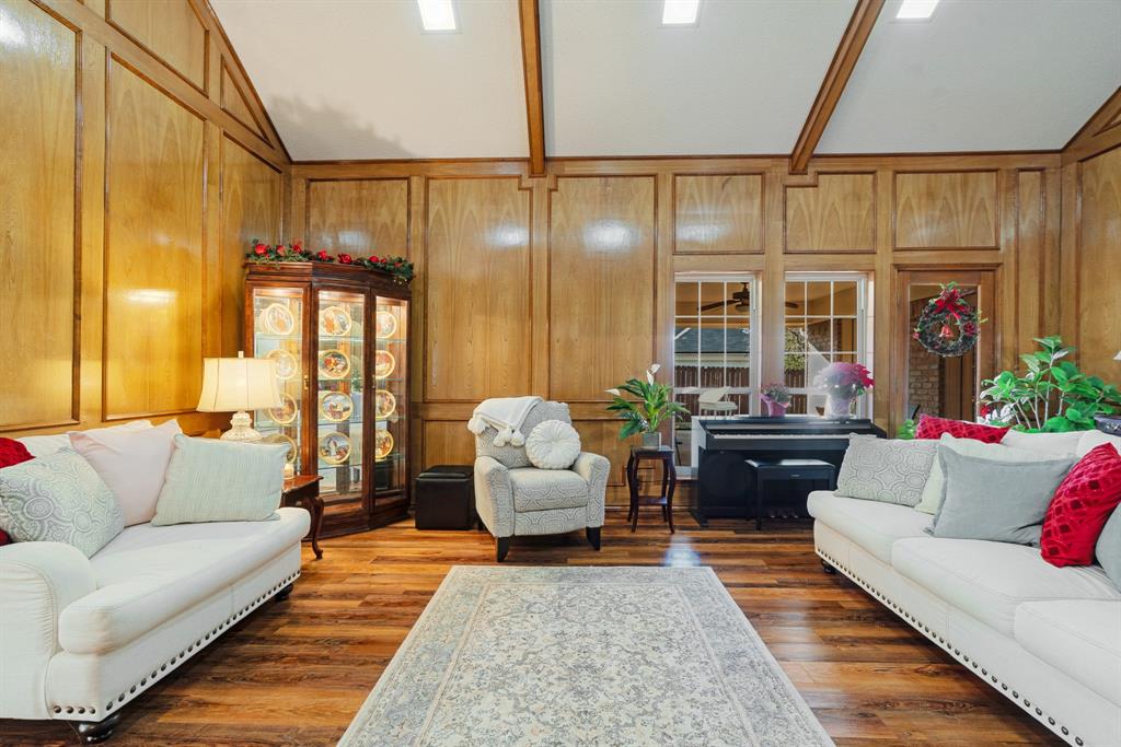 925 Medalist Street Paris, TX 75460 - Photo 5 of 24 a living room with furniture and a couch