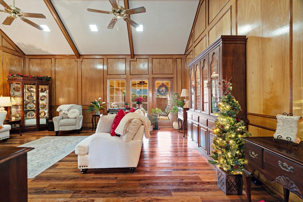 925 Medalist Street Paris, TX 75460 - Photo 6 of 24 a living room with furniture and a large window