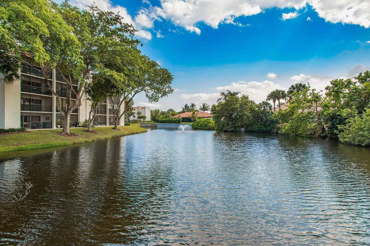 1605 Highway 1, Unit C302 Jupiter, FL 33477 - Photo 23 of 30 a view of a lake with houses