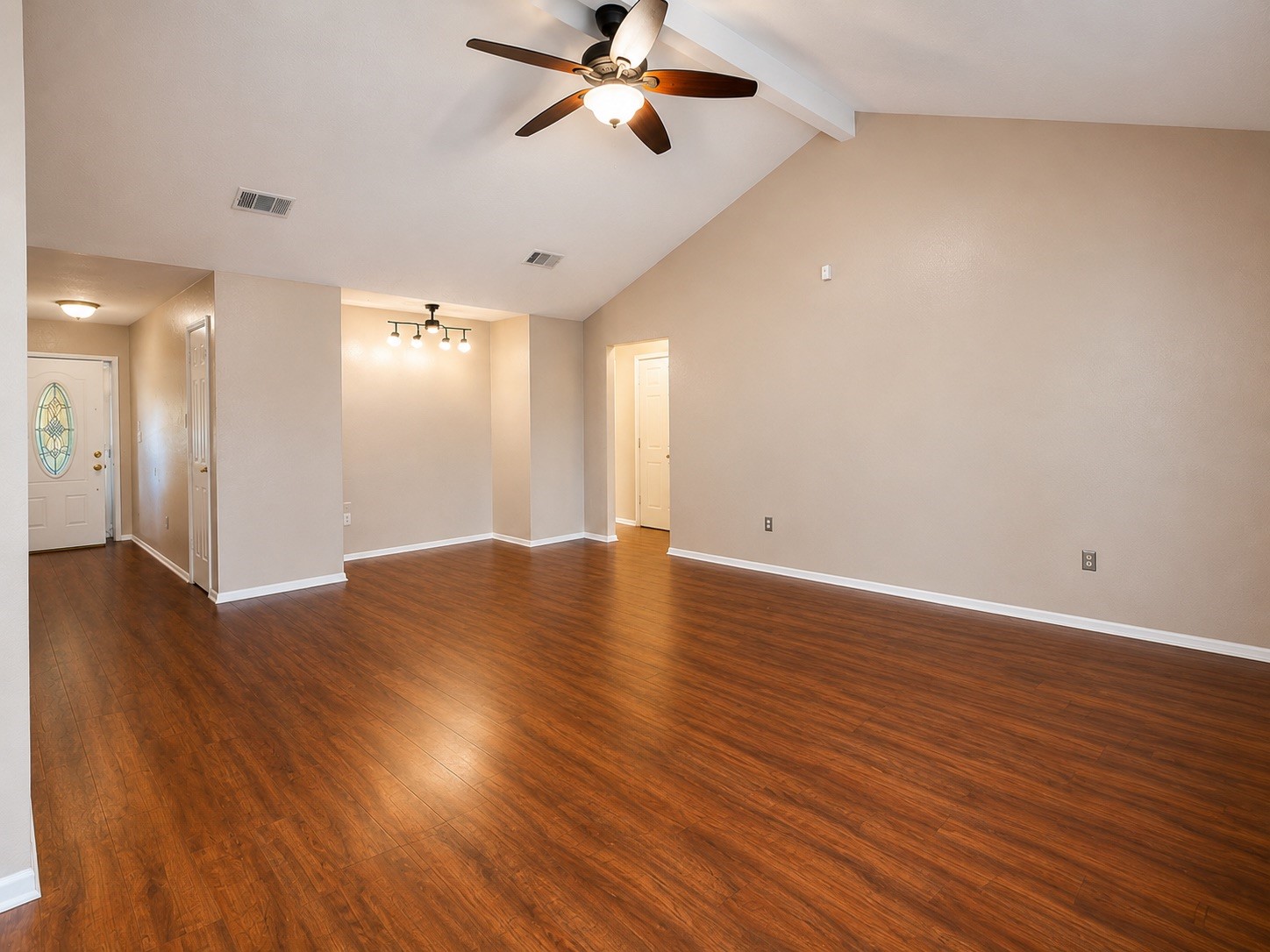 5810 Sunnygate Drive Spring, TX 77373 - Photo 4 of 16 a view of empty room with wooden floor and fan